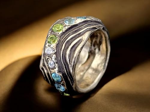 LeoLars-PABE Dangaster Wattenmeer Design Ring, Gr. 57 (18,3) aus 925er Silber mit Peridot, Blautopas und Bergkristall, Wellenmuster, teilgeschwärzt, Unikat, Handarbeit, Massiv